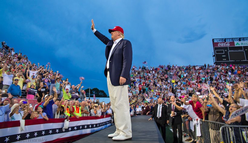 Donald J. Trump waves to a crowd of tens of thousands in Mobile, Alabama. (Photo: Julie Dermansky)