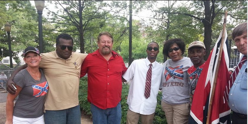 Anthony Hervey (second from left) and Arlene Barnum (third from right) with activists at a pro-Confederate flag rally in Birmingham (c/o Julie Bodenheimer‎)