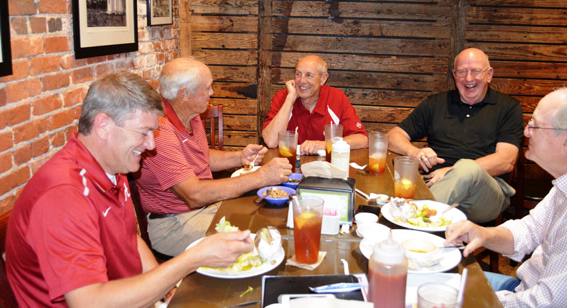 The ring was returned over a surprise Fish Market lunch. From left, John Burrows, Wayne Freeman, Bucky Wood, Larry Alley and Craig Christopher. (Michael Tomberlin/Alabama NewsCenter)