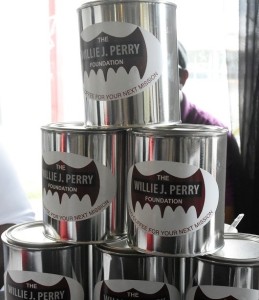 Cans of Willie J. Perry Foundation coffee. The organization seeks to carry on its namesake’s benevolent deeds. (Solomon Crenshaw Jr./Alabama NewsCenter)