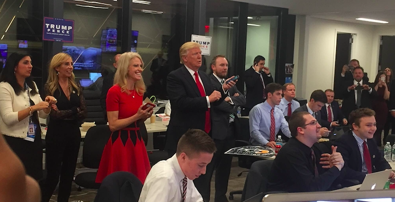 Campaign manager Kellyanne Conway, Donald J. Trump, and communications advisor Cliff Sims watch returns come in on Election Night.