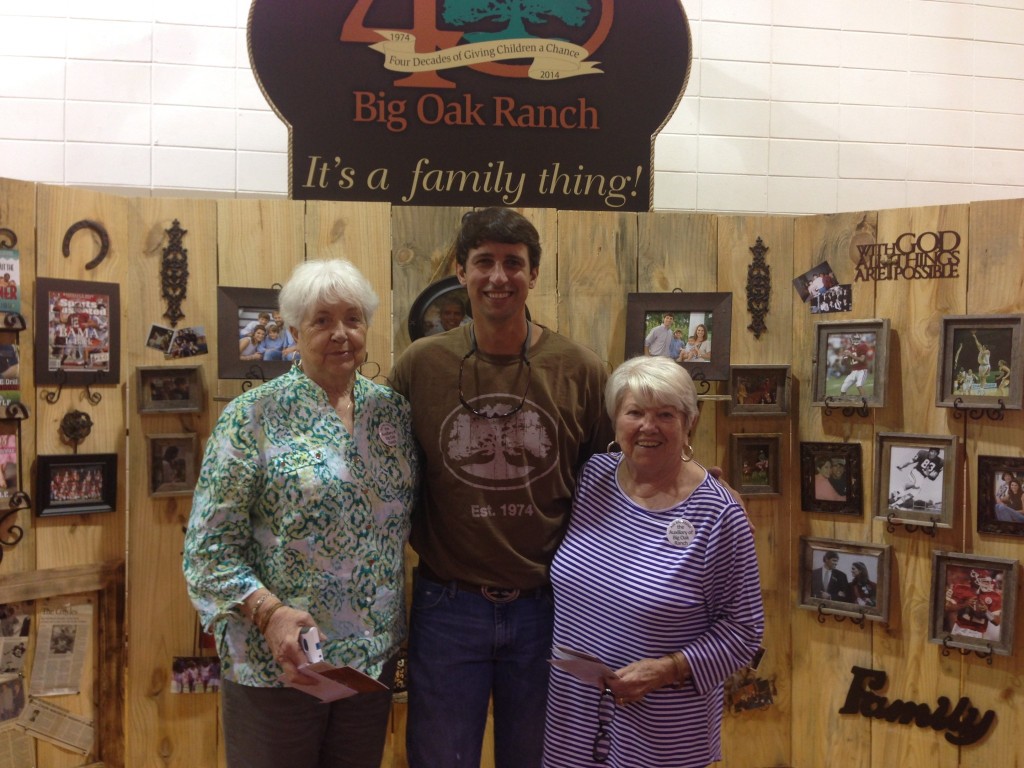 Mama B (pictured right) with Brodie Croyle (center)