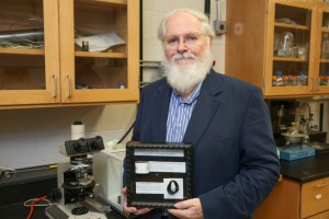 UAH’s William Kaukler developed a green method of creating cellulose fiber that is cooked to its carbon equivalent and used in solid rocket nozzles. (Image: Michael Mercier/UAH).