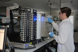Working with assays in Sourthern Research’s High Throughput Screening lab.